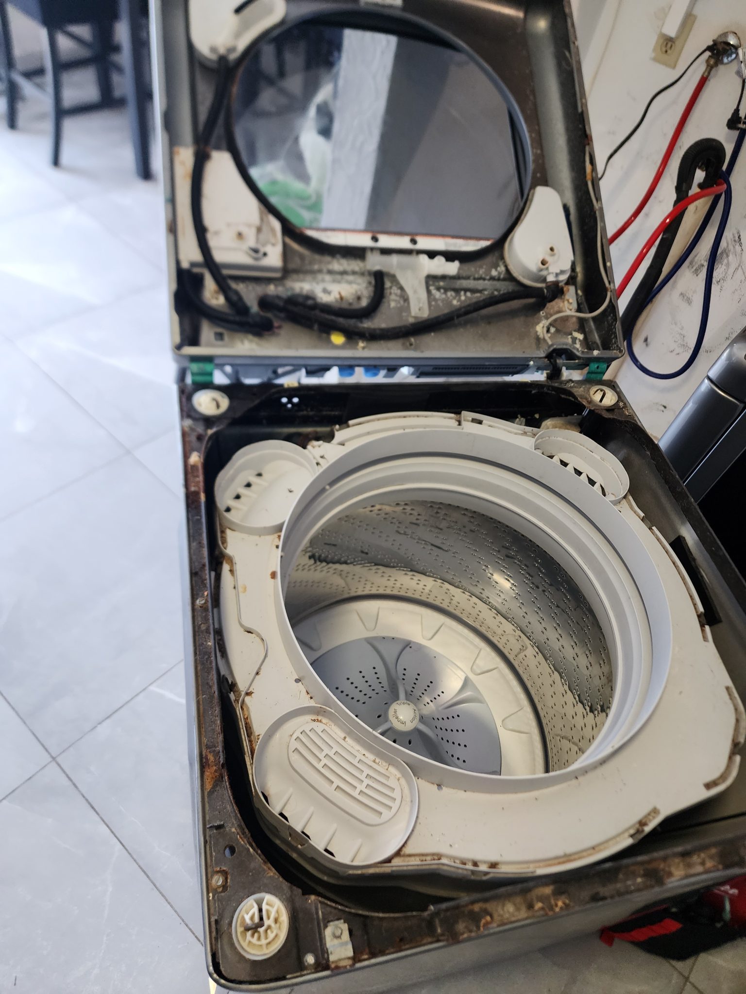 Washer disassembled for inspection