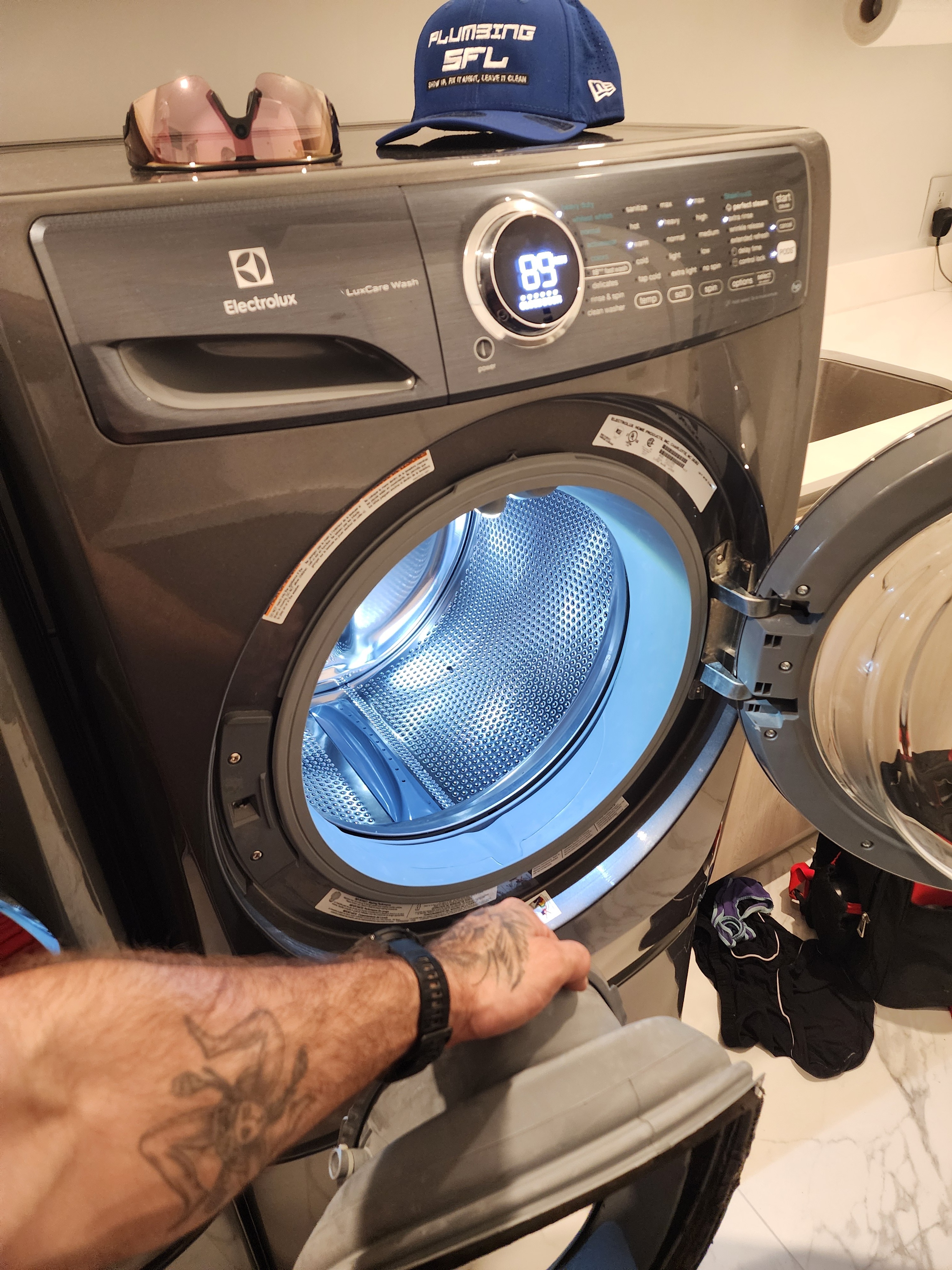 Electrolux washer with door open during service in Fort Lauderdale FL.