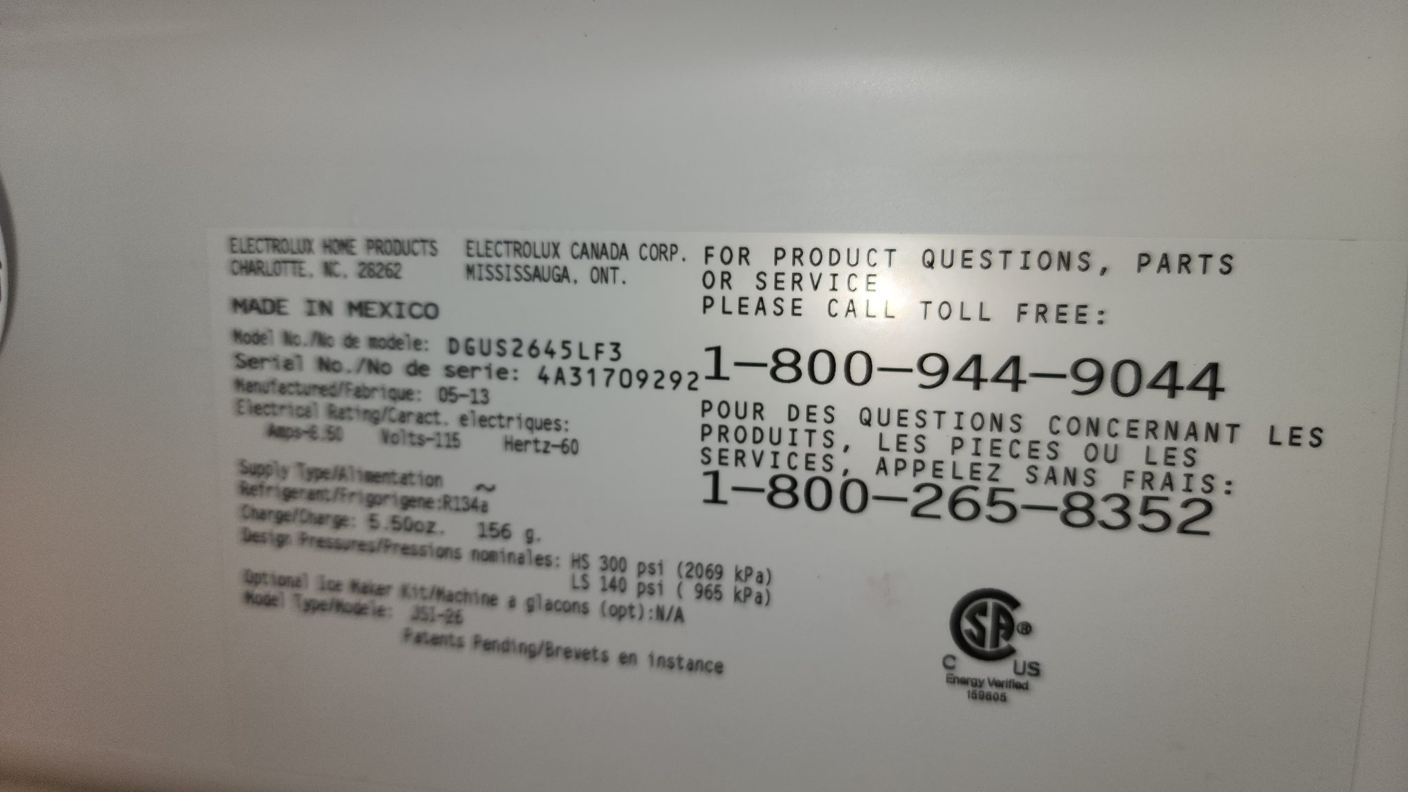 Frigidaire Side-by-Side Refrigerator model number tag DGUS2645LF3 showing manufacturer specifications and electrical ratings.