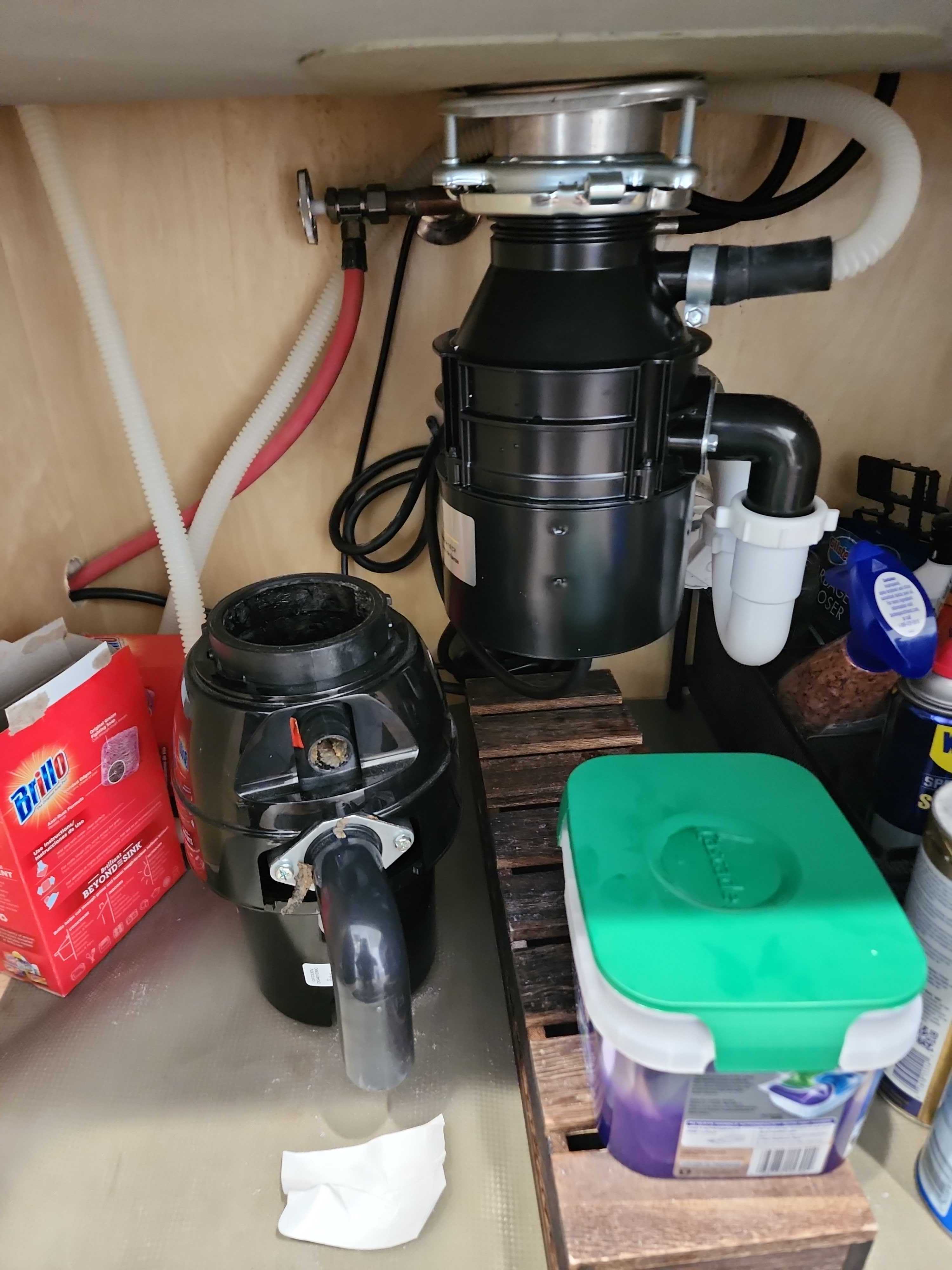 Installed garbage disposal under kitchen sink during appliance service in Margate FL RR0087