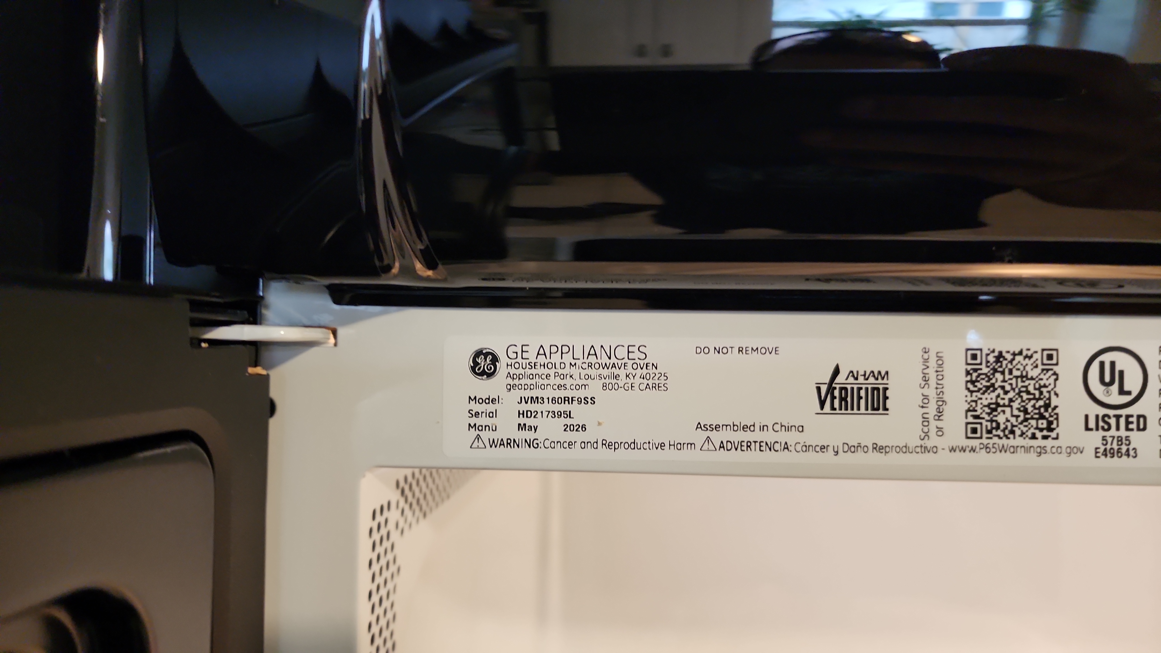 GE JVM3160RF9SS over-the-range microwave model tag Fort Lauderdale FL RR0085