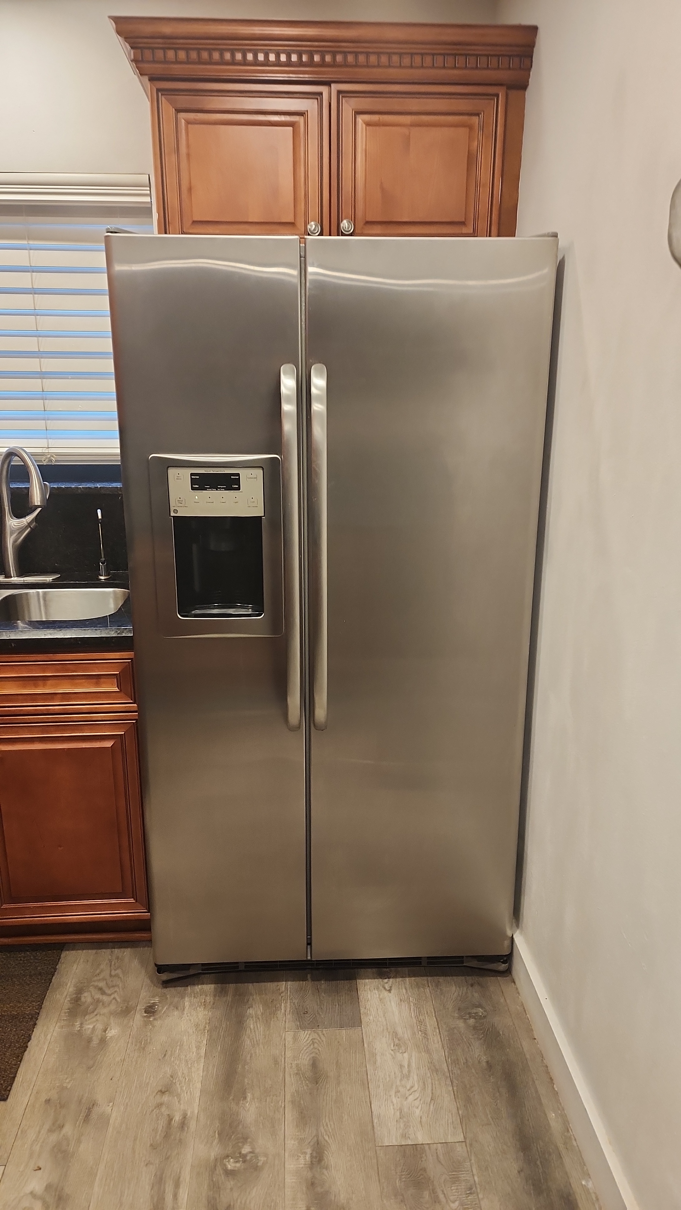 GE side-by-side refrigerator installed in Margate FL kitchen RR0099