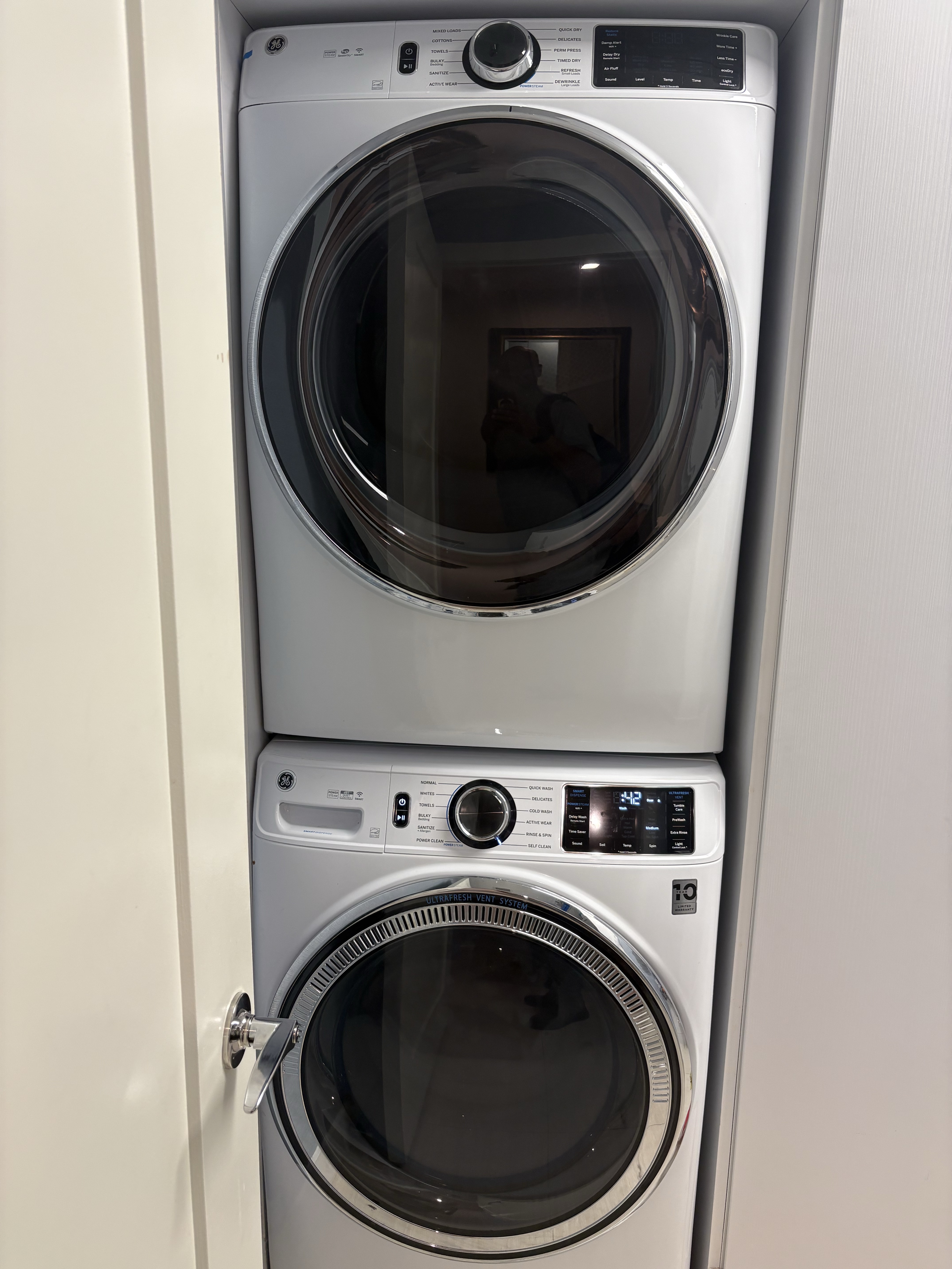 Floor area behind GE washing machine inspected for possible leak in Boca Raton FL RR0065.