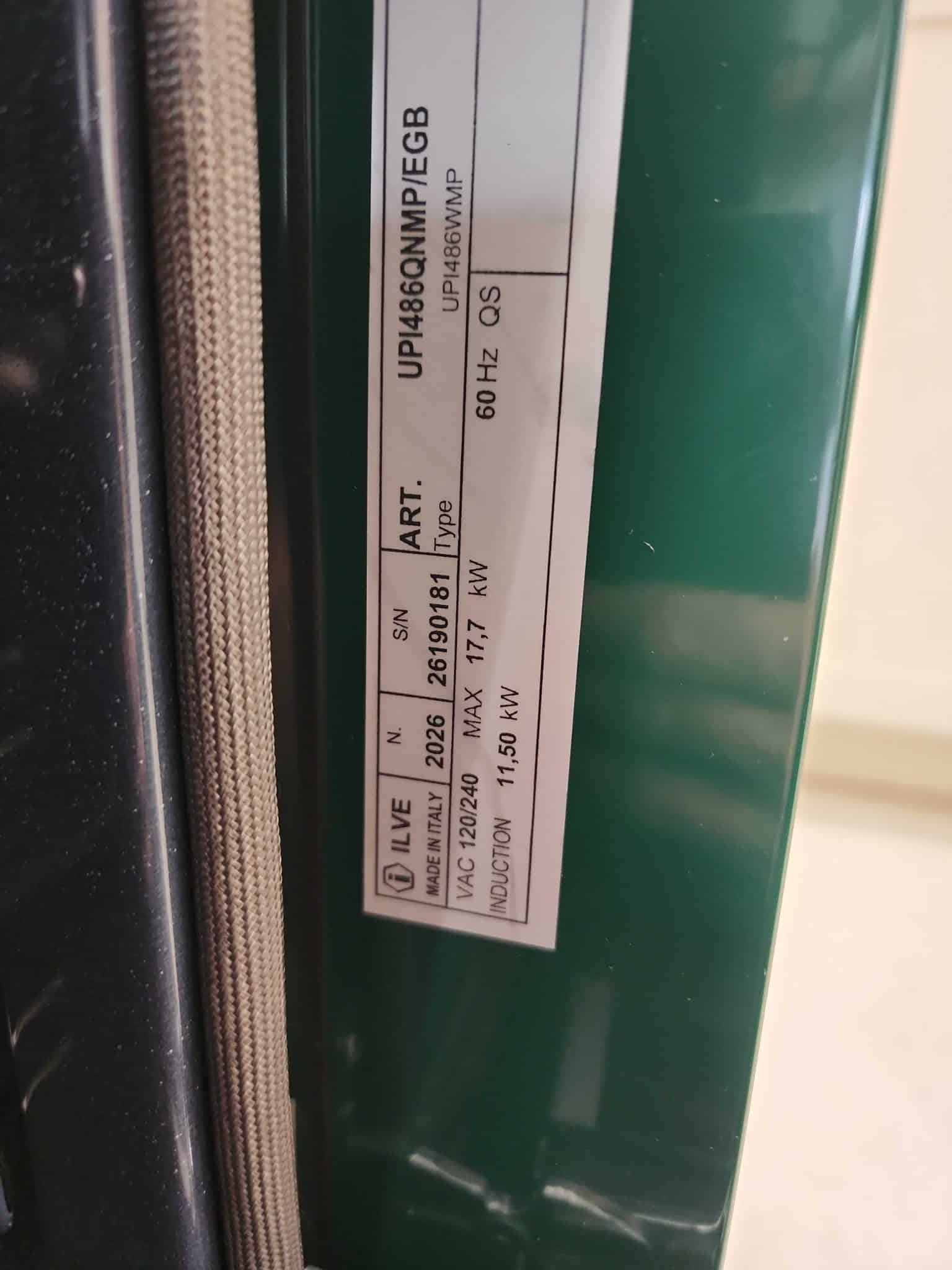 Manufacturer specification sticker for an ILVE induction range, made in Italy, showing the model number UPI486QNMP/EG and serial number 26190181.