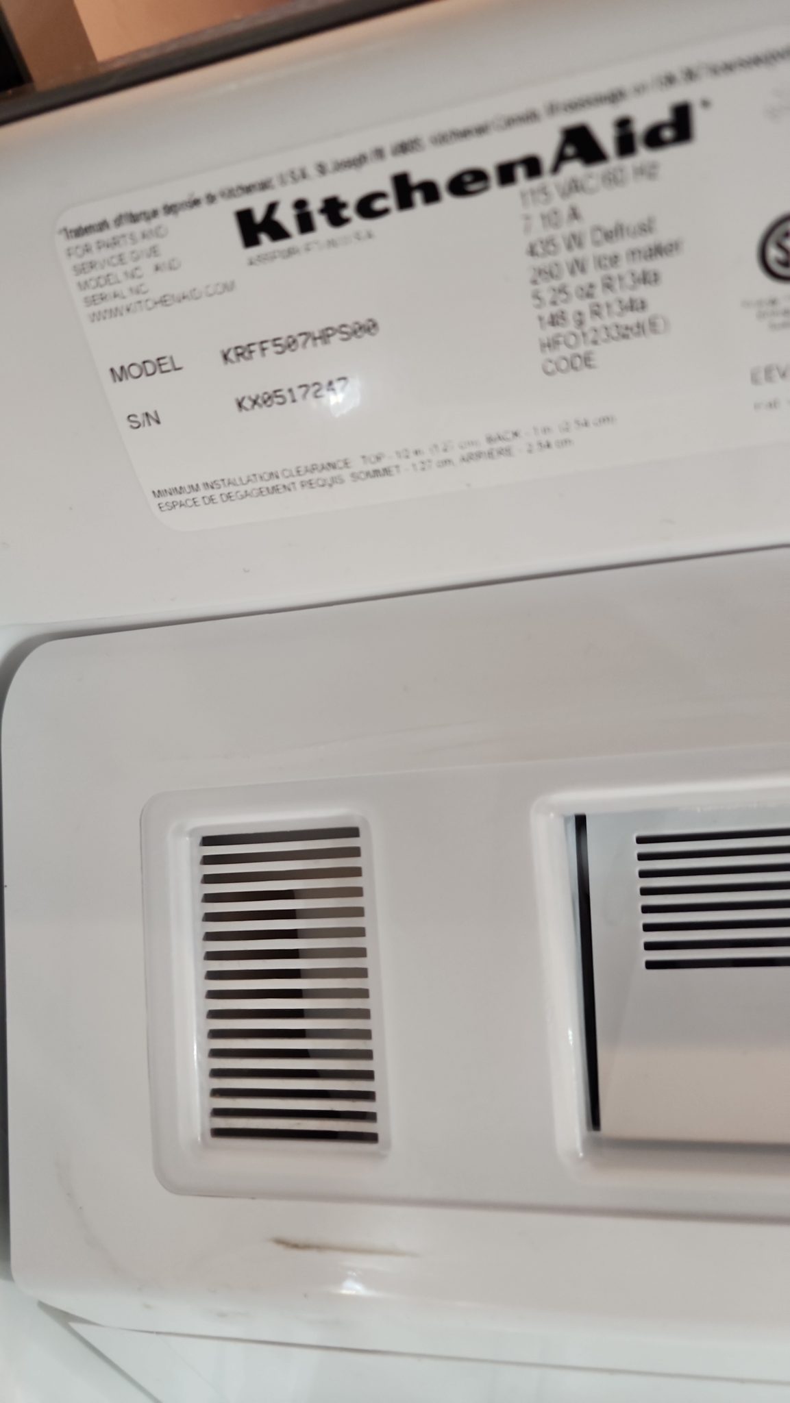 Interior manufacturer sticker for a KitchenAid refrigerator displaying model number KRFF507HPS00.