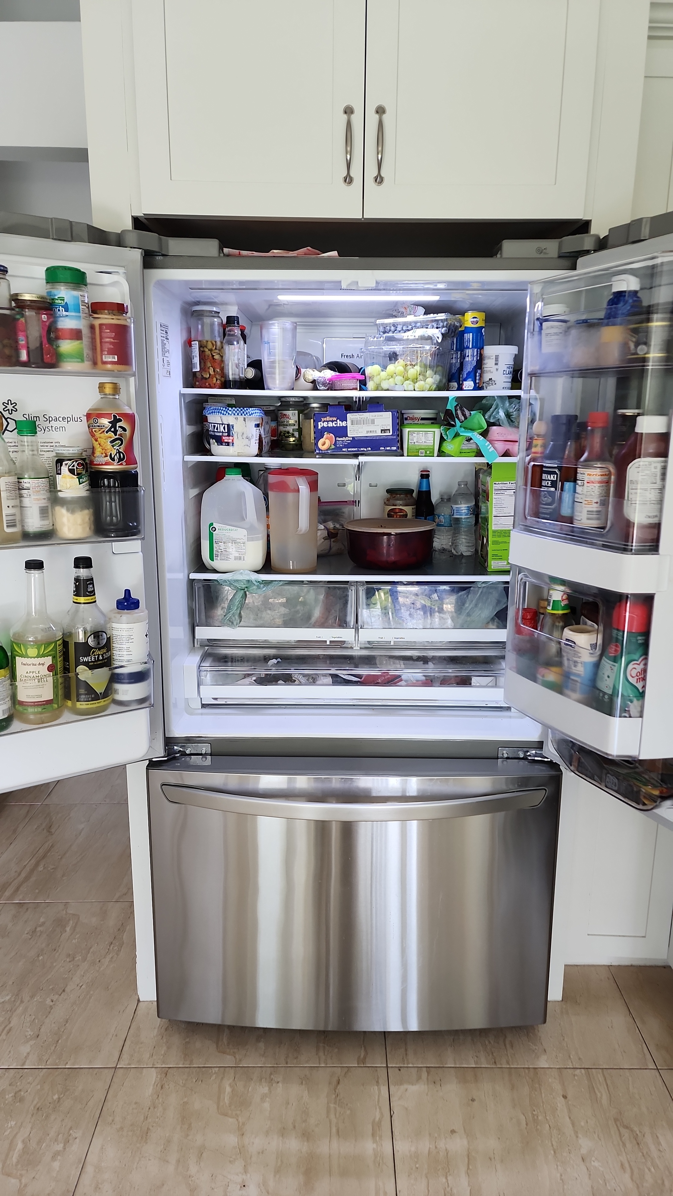 Field photograph of the LG refrigerator during the service visit.