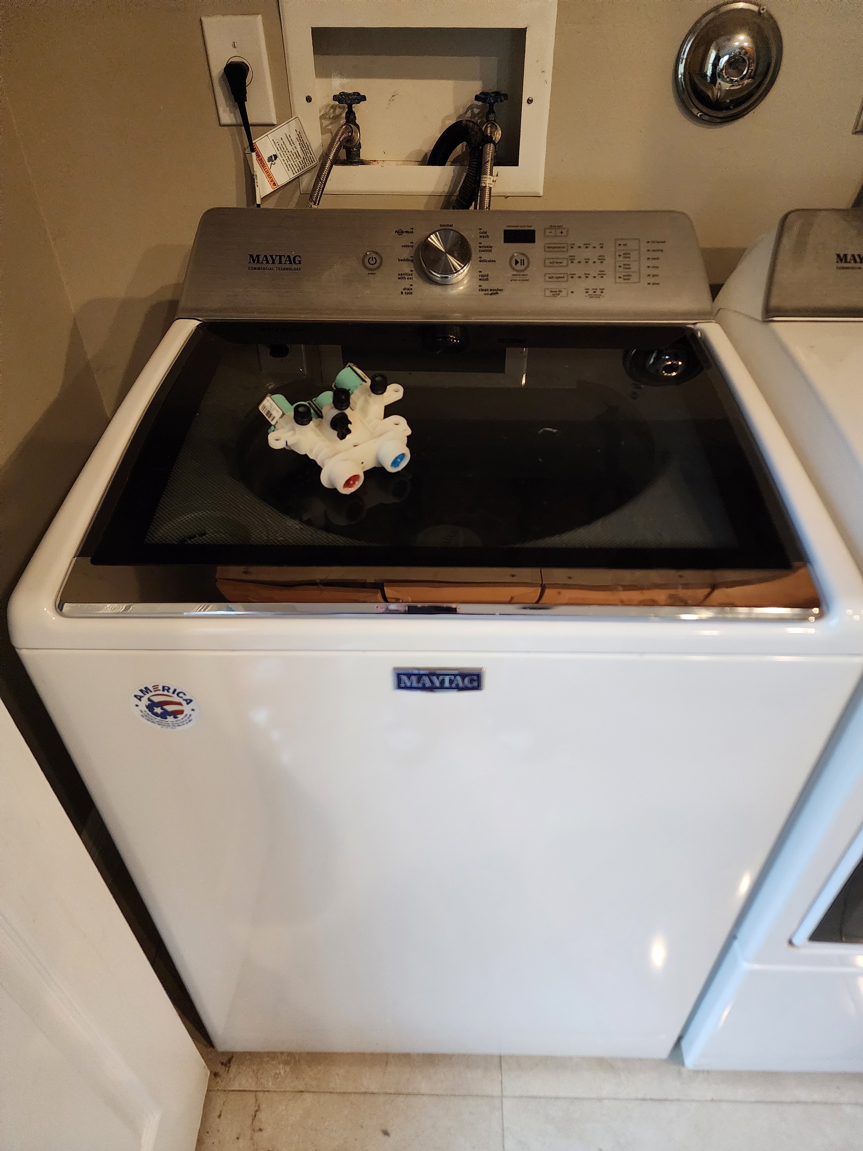 Failed Maytag washer water inlet valve assembly removed in Coconut Creek FL.
