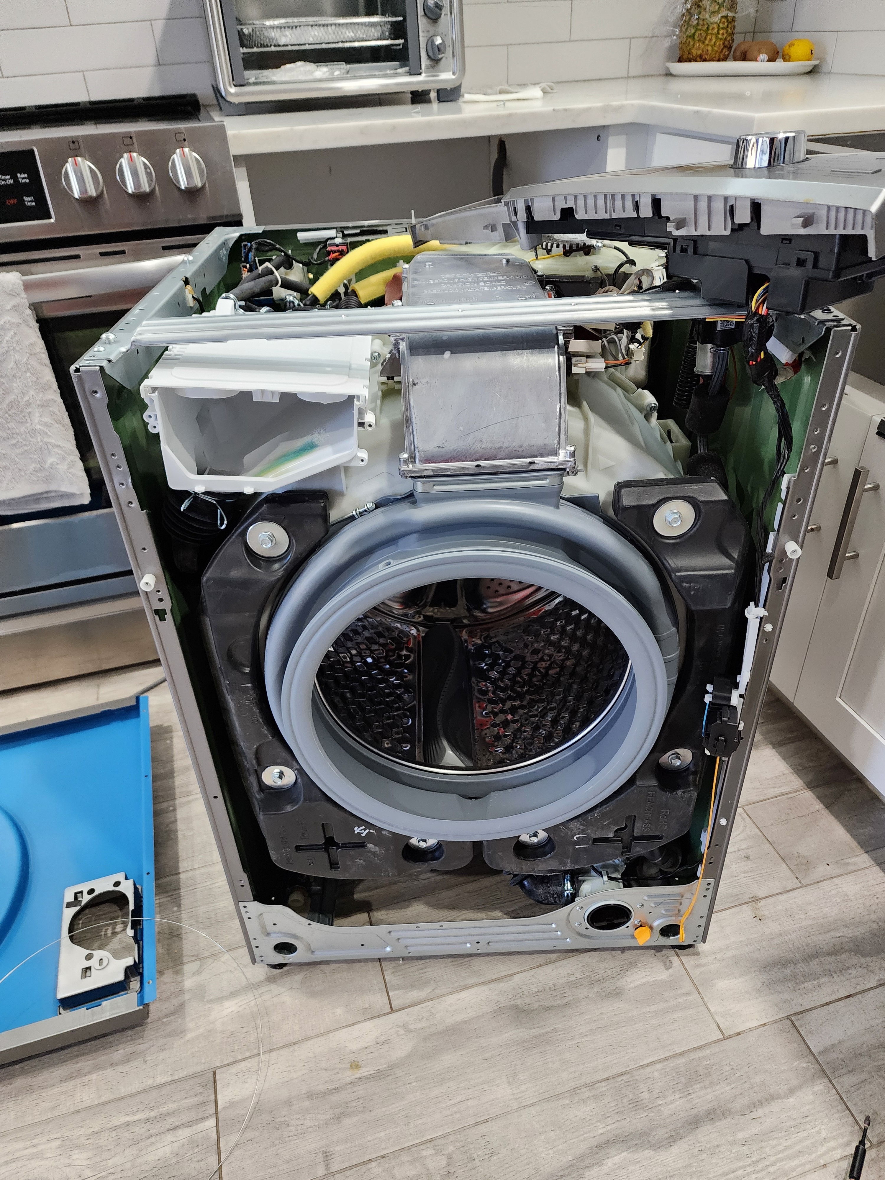 Summit washer with front panel and control board removed during door gasket replacement service RR0101