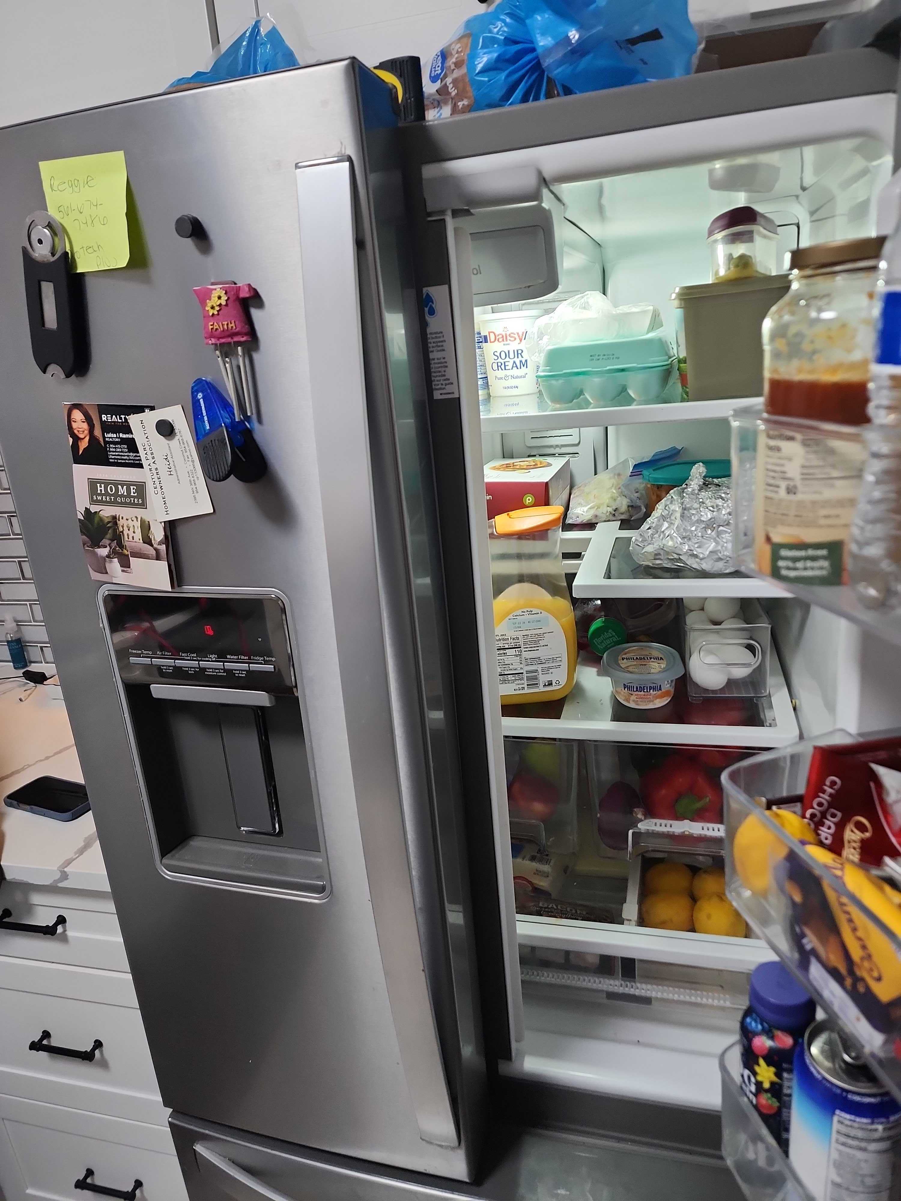 Open Whirlpool French-door refrigerator interior during service call in Coconut Creek FL RR0090