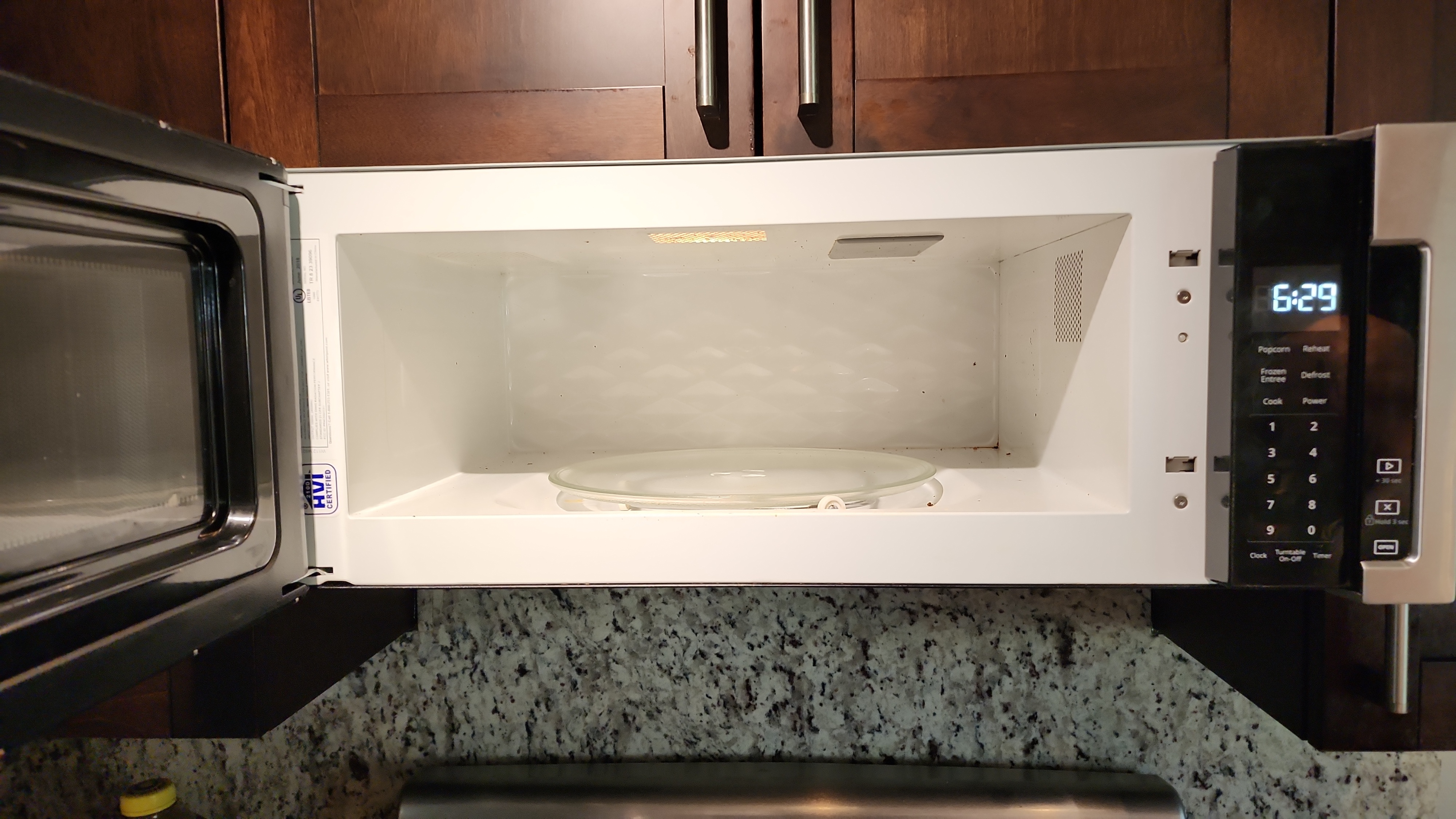 Whirlpool microwave oven with door open during repair service in Margate FL RR0079