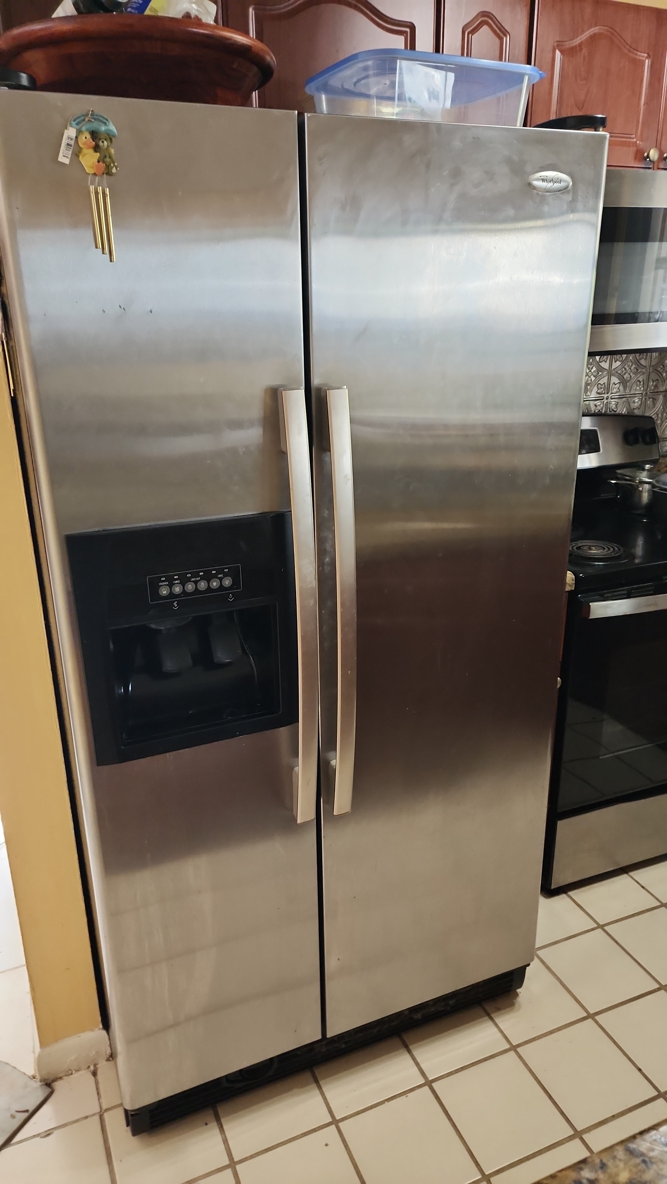 Whirlpool ED5PVEXWS02 side-by-side refrigerator installed in Margate FL kitchen RR0102
