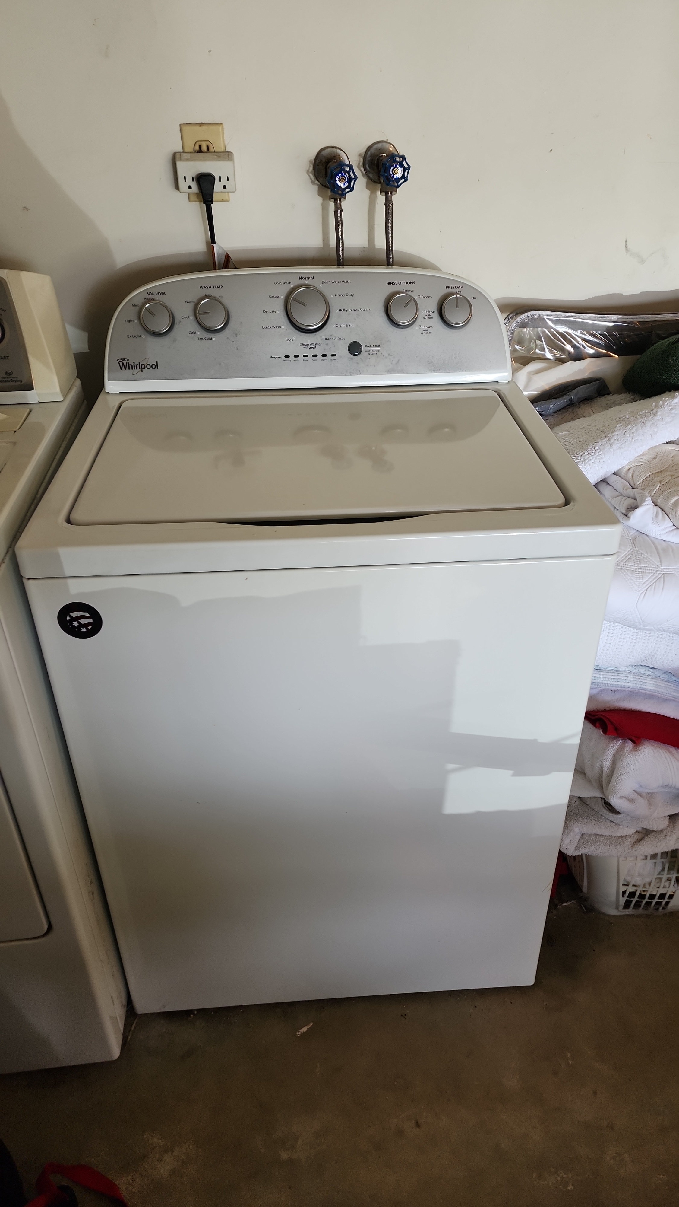 Washing machine diagnosed with bad bearing in Coral Springs FL 33065 RR0066, showing a Whirlpool top-load washer.