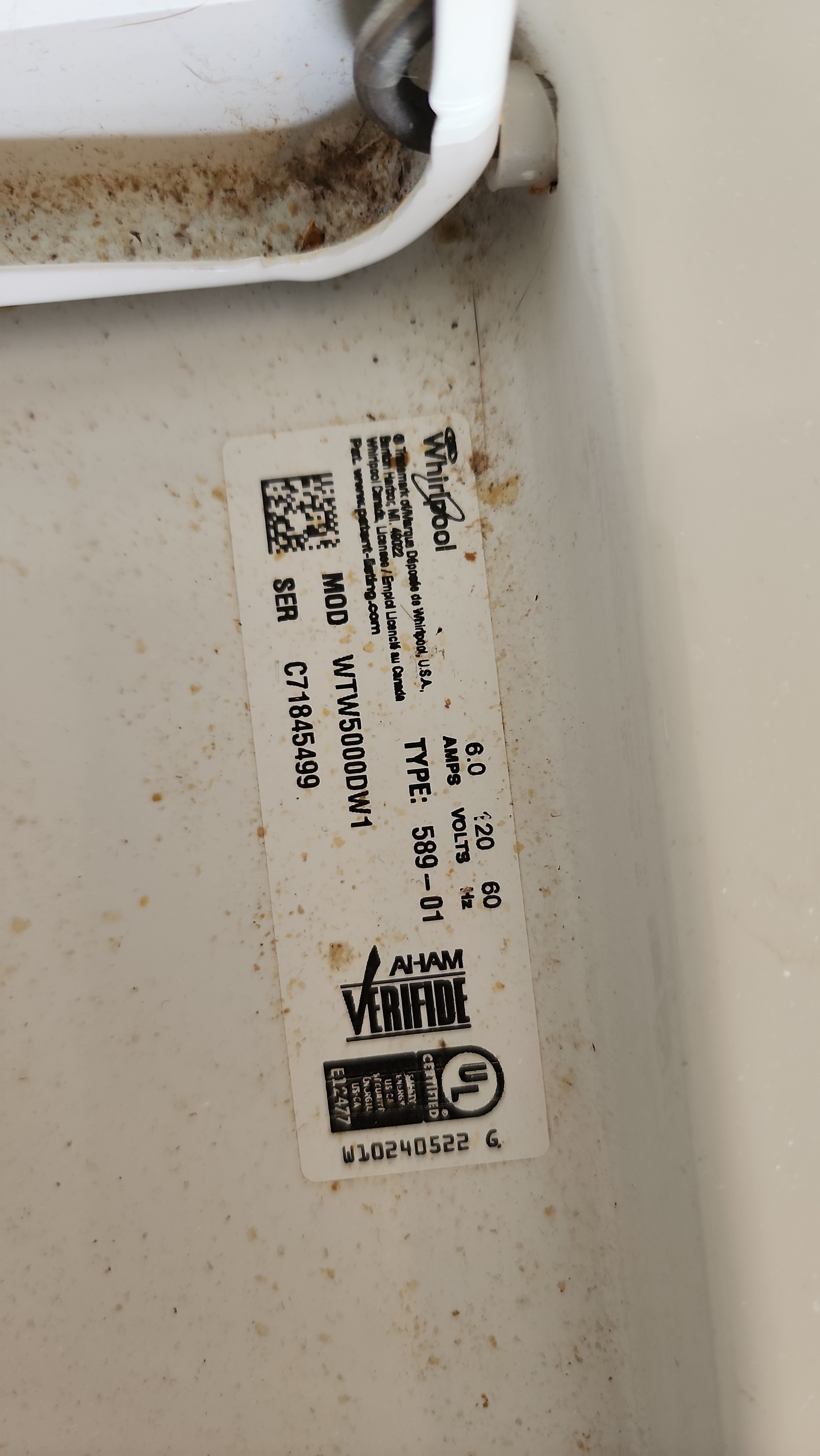 Whirlpool washing machine model WTW5000DW1 identification label documented during bad bearing diagnosis in Coral Springs FL RR0066.